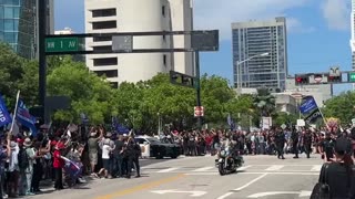 Protester rushes Trump motorcade after leaving federal court in Miami