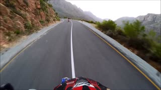 Friends riding motorbikes in the Mountains