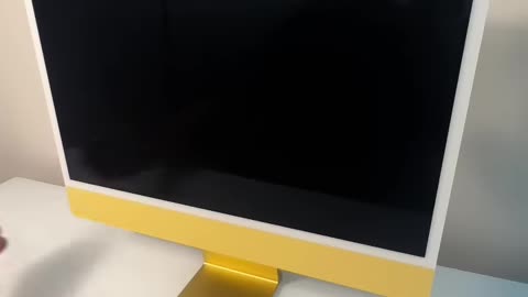 Unboxing yellow Apple imac