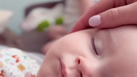 Cute baby kisses her brother