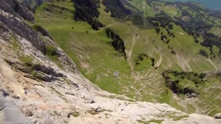 POV wingsuit proximity flight in Switzerland