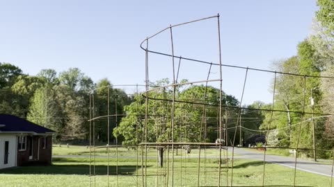 Reclaiming wire to use as tomato cages.