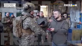 Zelensky puts on his serious face as he presents Ukrainian troops with medals