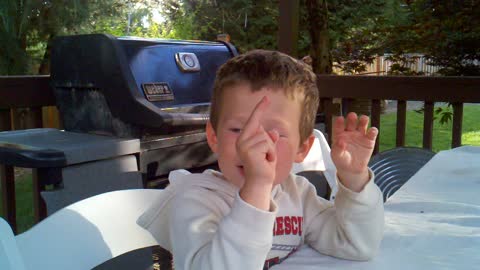 Little boy has a special middle finger...