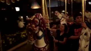 Cason on the carousel in the Magic Kingdom WDW.January 2007