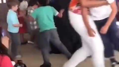 Kid jumps into a Fight to save his Favourite Super Hero. Too funny