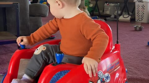 One-Year-Old Nods Off While Driving Toy Car