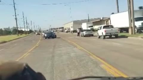 Guy driving catches a shooting live on tape.