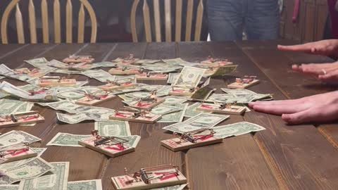 Family Plays Mouse Trap Cash Grab Game