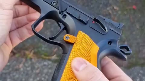 "CZ Orange Pistol 9mm: A Uniquely Colored Handgun with Reliable Performance".