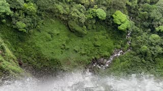 Couple Sit On Columbia's Highest Waterfall