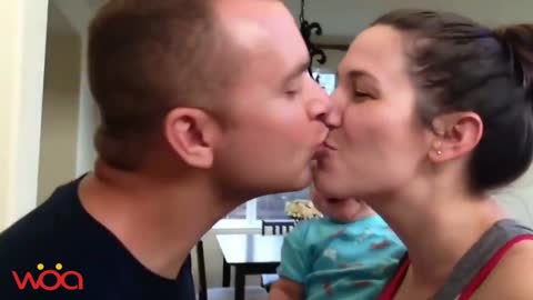Baby Does Not Want To See Mom and Dad Kissing