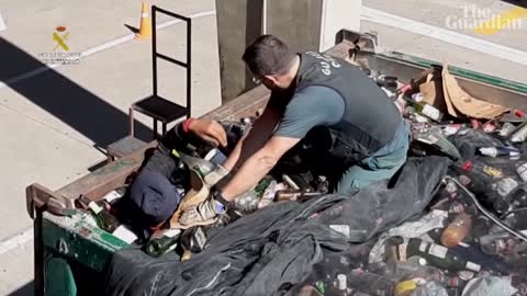 Spanish police rescue migrants hidden in waste containers