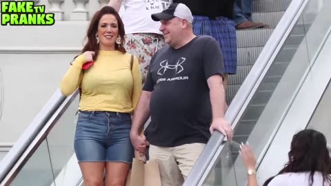 The best escalator prank.*couples reaction*