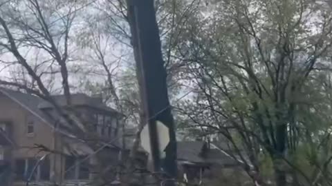 Watch as a Student gets blown over due to powerful severe storms while trying to get to the campus