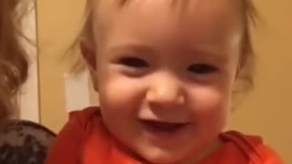 the child laughed out loud because of his mother's behavior