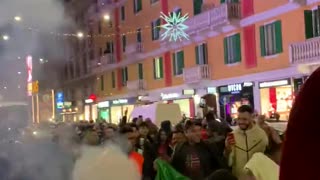 Fans in Milan celebrate Morocco's World Cup win over Spain