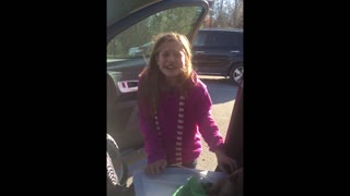 Little girl cries over a fantastic Christmas surprise