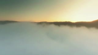 Heavenly Feeling when drone captures footage from above cloud