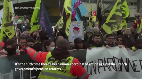 Protesters march in Paris over pension reform