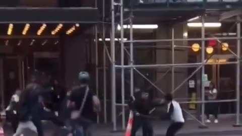 MOBS OF ROWDY NYC ILLEGAL MIGRANTS BRAWL OUTSIDE A MIDTOWN HOTEL