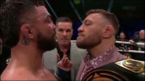 Conor McGregor faces off with Mike Perry; Steals BKFC belt