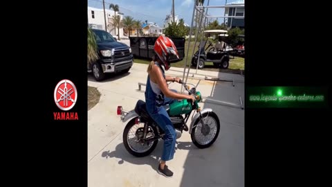 A Florida Woman takes a 1972 Yamaha LT2 for a spin.