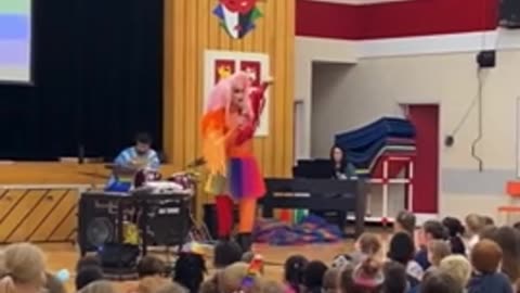Transgender Singing to Auditorium of Children in Canadian public school system