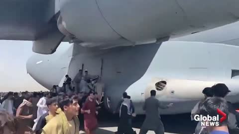 DESPERATE locals cling to US Air force plane to leave the country 😲😲😲😲😲😲