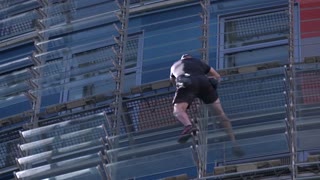 'Spiderman' and son climb first skyscraper together