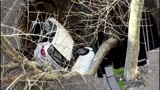 Two cars swallowed in Naples sinkhole