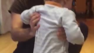 Toddler tries walking after being spun around