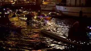 Decorated canoes light up Copenhagen canals