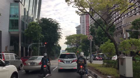 Use the carriages and crates on the side of the road to get close to it