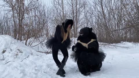The girl danced ballet with the bear!