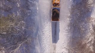 Snowplow Clears Deep Heavy Snow After Storm