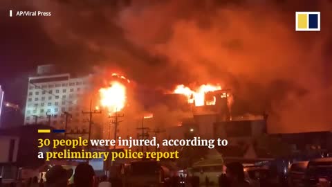 Massive fire engulfs Cambodian casino, people jump out of windows to escape
