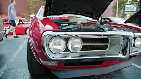 Close-up Of The Front End Of A Parked Classic Car With Its Engine