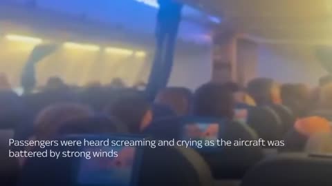 Passengers scream and cry as flight battered by powerful storm