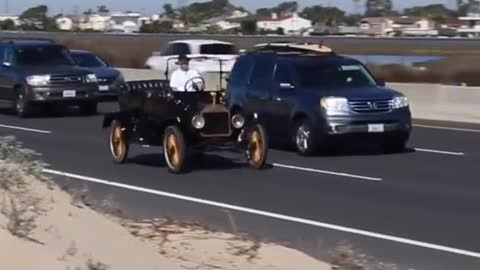 A Ford Model T trying to blend in with today's traffic