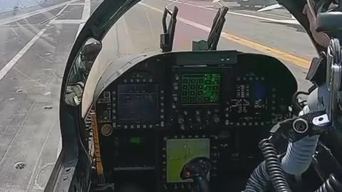 View from inside a F-18 cockpit taking off from an aircraft carrier. Video by Ayesha Creates.