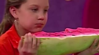 The competition eats watermelon,