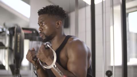 Man Working Out in Gym