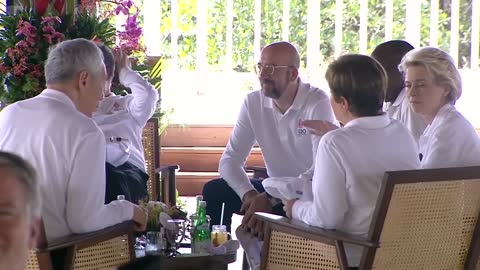 US President Joe Biden wearing dark Aviator Sunglasses joins global leaders at Hutan Mangrove Forest