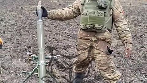 On the range, training foreign volunteers.