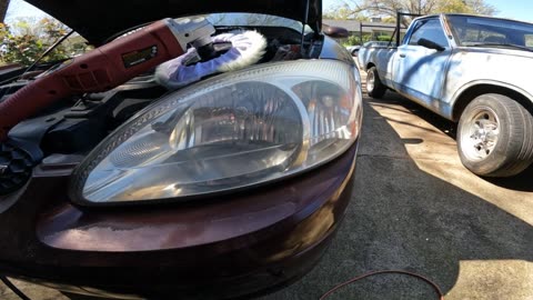 Fixing Faded or Hazy Headlights on a 2000 Ford Taurus