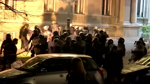 Protesters hurl stones at Belgrade city hall to protest elections