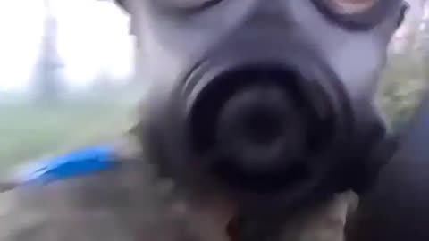 Colombian soldier wearing gas mask during alleged use of tear gas by Russians