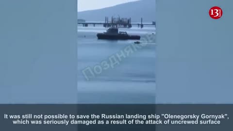 Image of a sinking Russian amphibious assault ship hit by Ukrainian uncrewed surface vessels