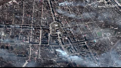 Images show smoke rising from Ukrainian cities